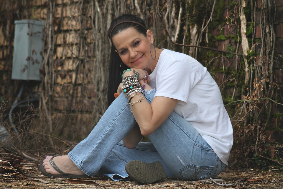 Woman posing outdoors