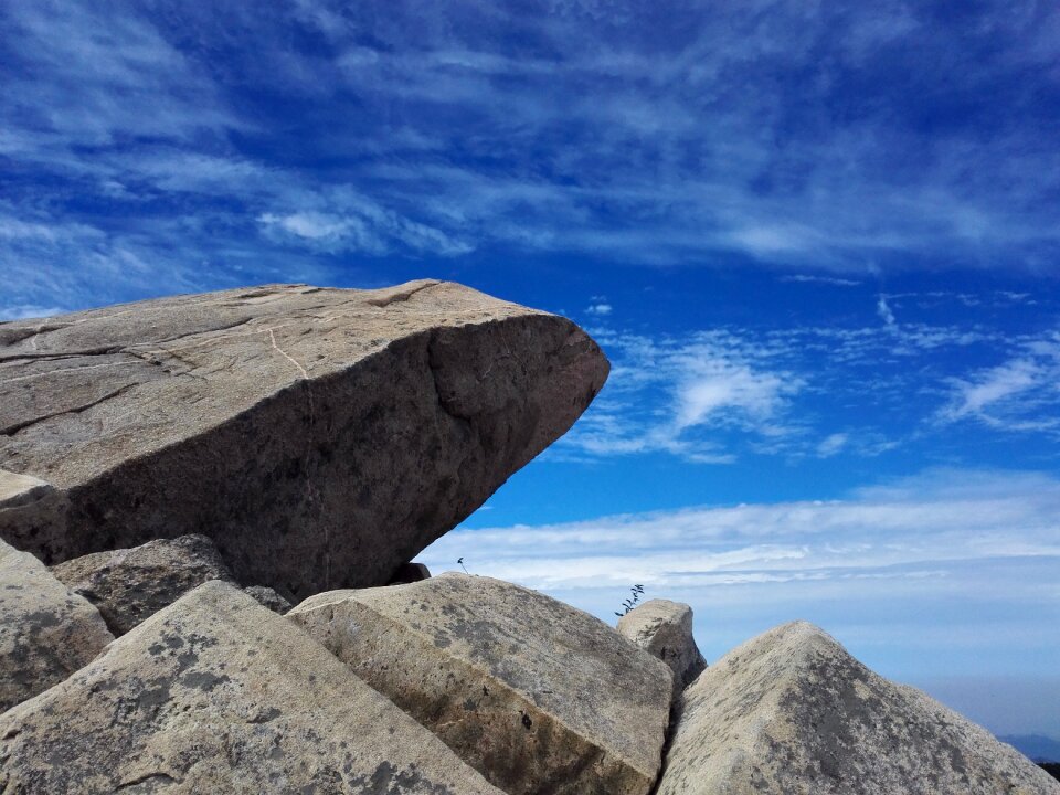 Stone blue sky the clouds photo