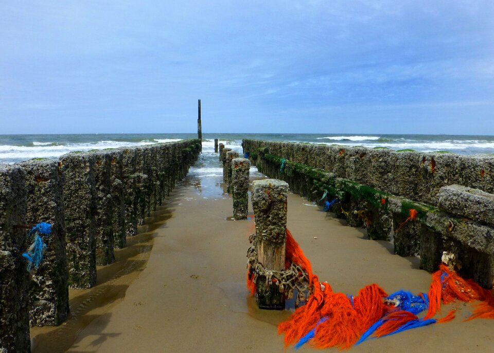 Flotsam fishing net sand