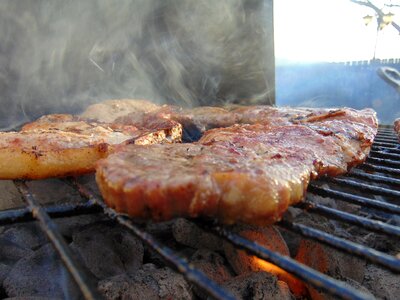 Charcoal grill pork steaks