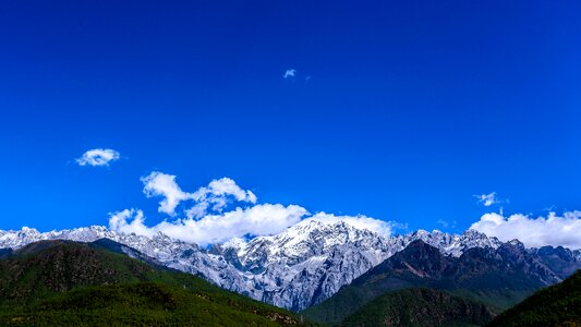 Blue sky mountain snow photo