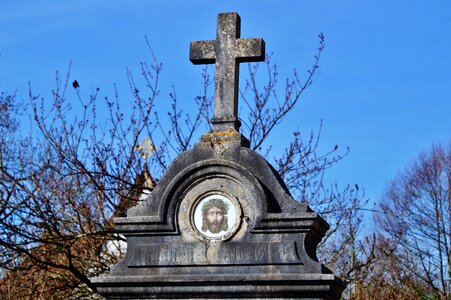 Old cemetery mourning graves photo