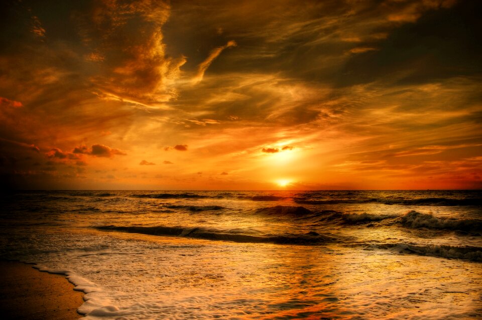 Evening sky coast water