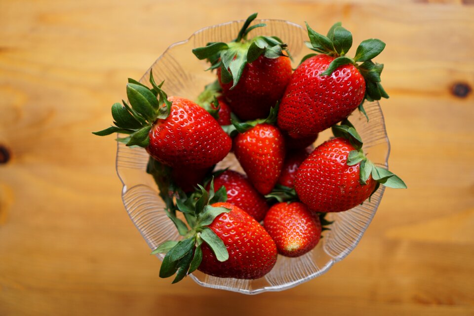 Mature lean a collection of strawberries