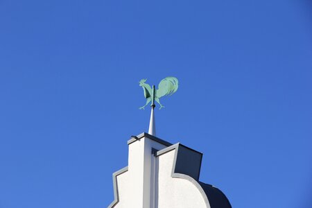 Weather vane blue sky spire