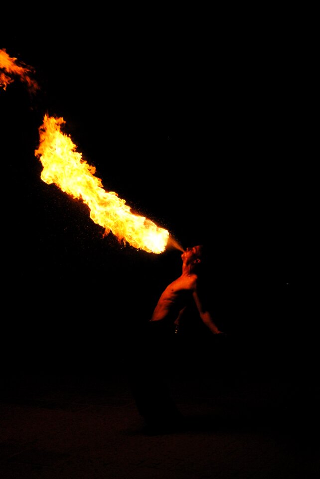 Fire eaters show fire