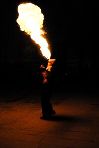Fire eaters show fire