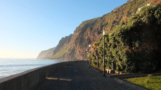 Sea mountain blue sky photo