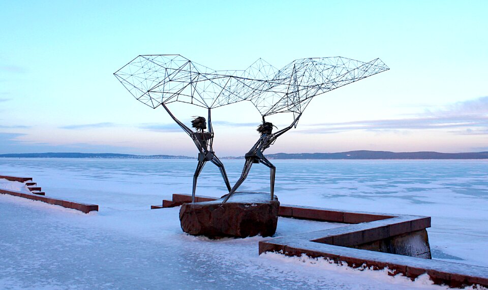 Fishermen metal sculpture winter landscape
