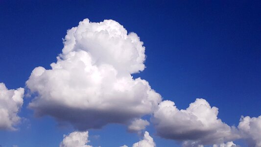 Clear sunny blue sky clouds photo