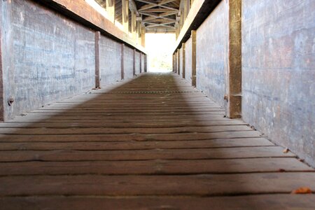 Wooden bridge escape railing photo