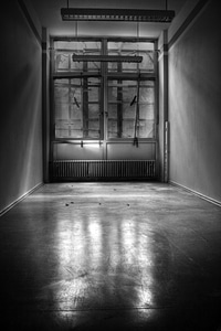Prison cell tract black and white photo