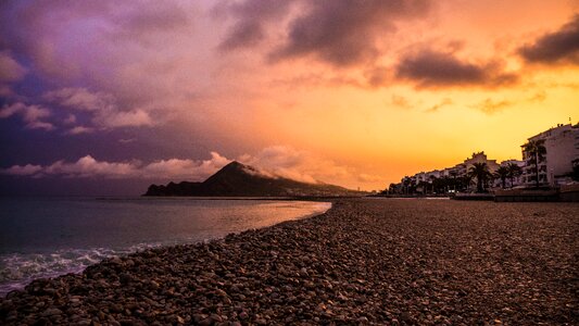 Ocean sunset mountains