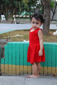Toddler baby in red young photo