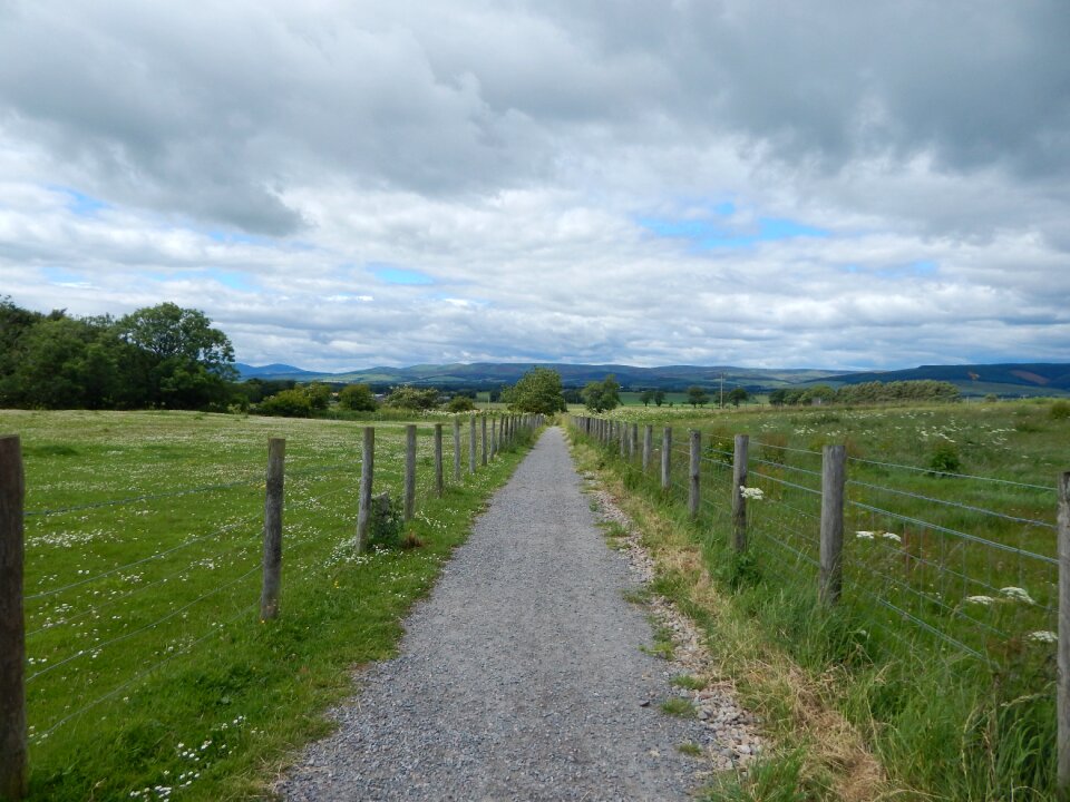 Pathway cloudy sky