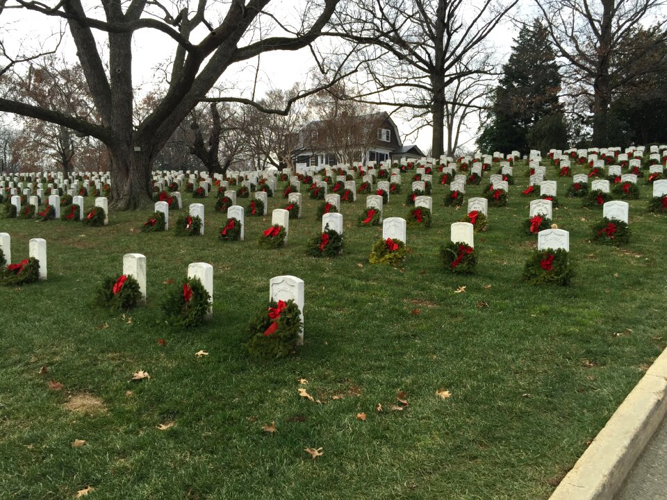 Cemetery graves with wreaths