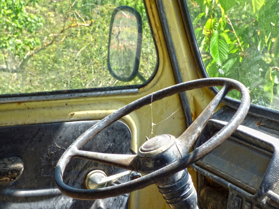 Rear-view mirror old abandoned rusty