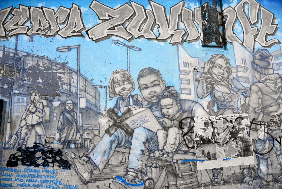 Mural sprayer wall