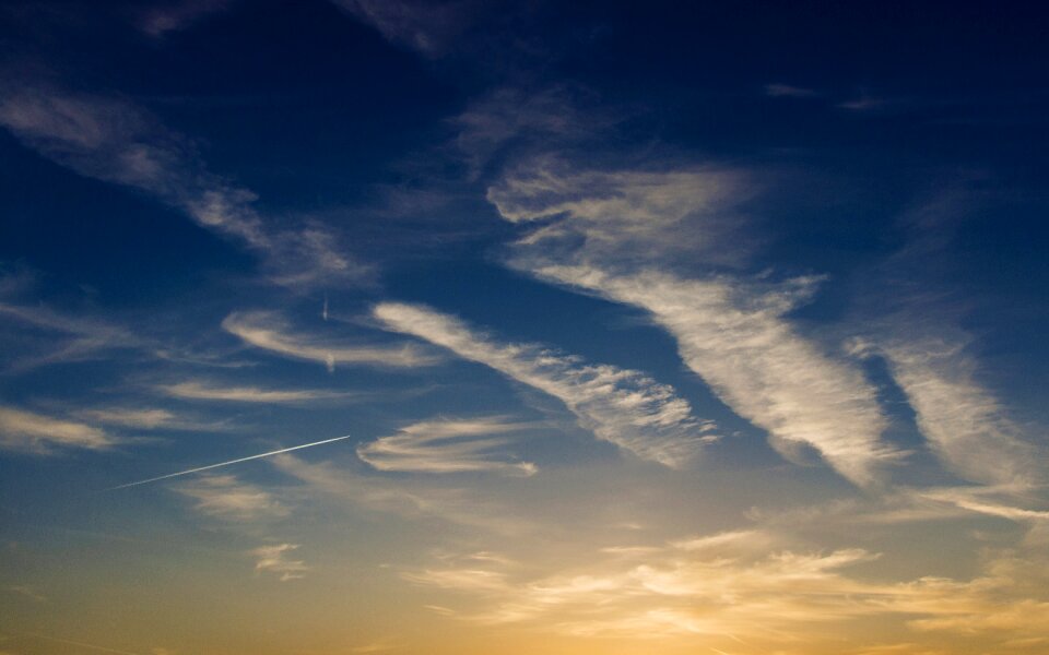 Dark blue the golden hour clouds