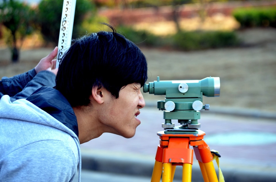 Surveyor surveying job