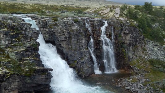 Cliff gray waterfall