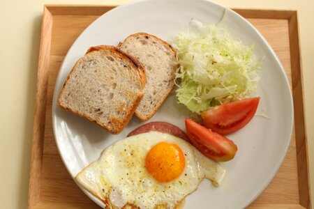 Breakfast brown rice bread fried egg photo