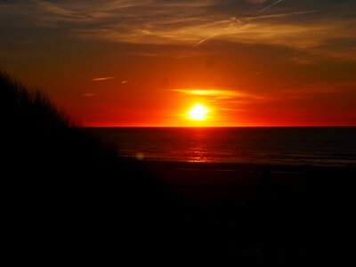 Brand setting sun sea photo