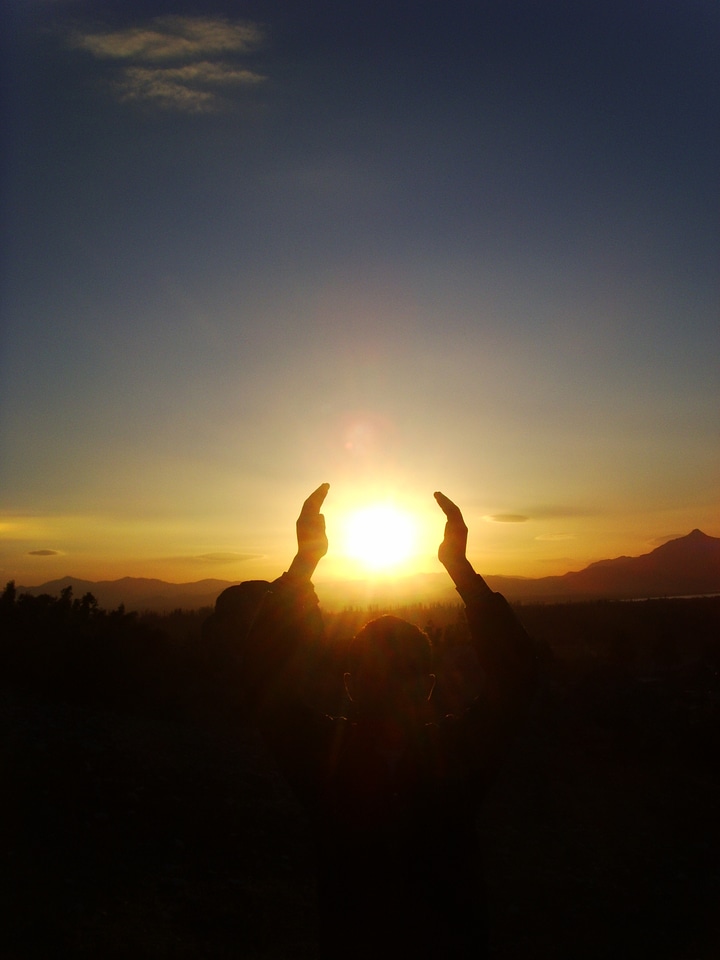 Sun holding light