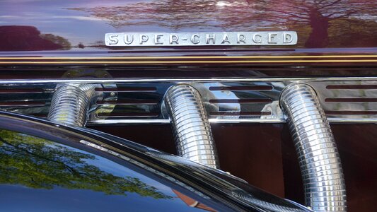 Elegant super charged old car photo