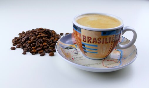 Coffee beans coffee cup crema photo