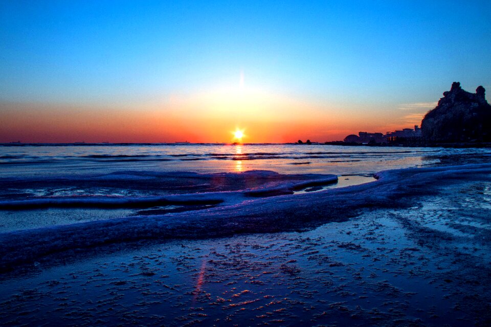 Winter beach sunrise