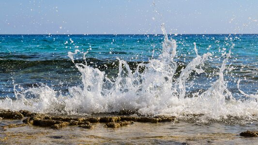 Wave smashing sea photo