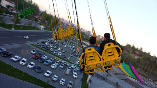 Amusement park swing family photo