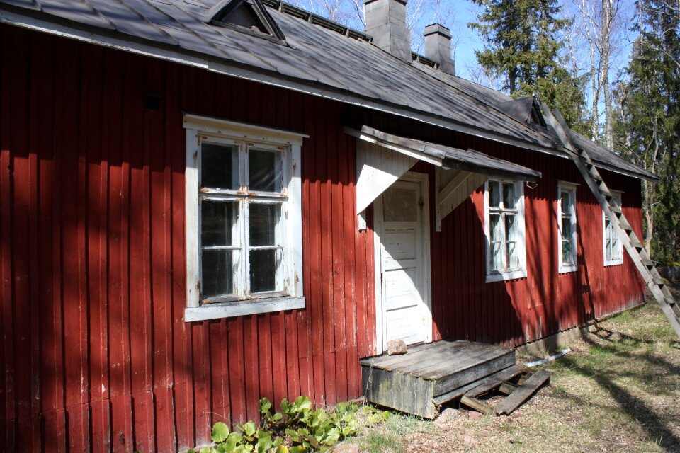 Red wooden house old