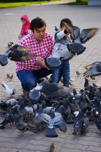 Feeding pigeons russia vacation photo