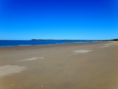 Blue sea sand photo