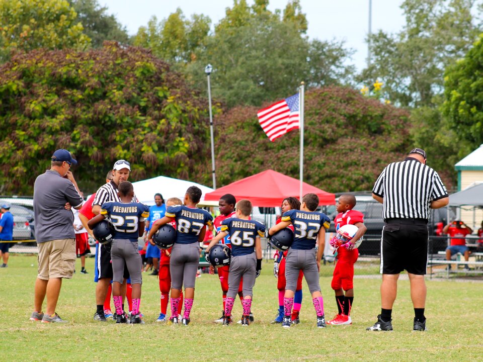 American football coin toss kid