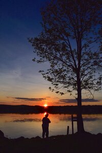 Sunset fishing water photo