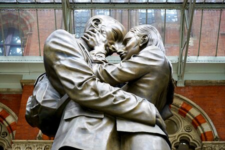 Couple leaving st pancras station photo