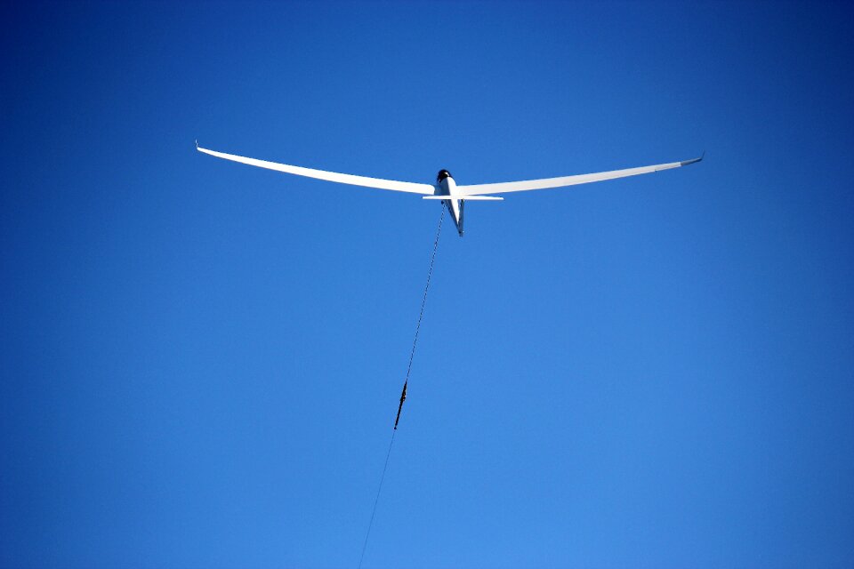 Gliding aircraft towing glider