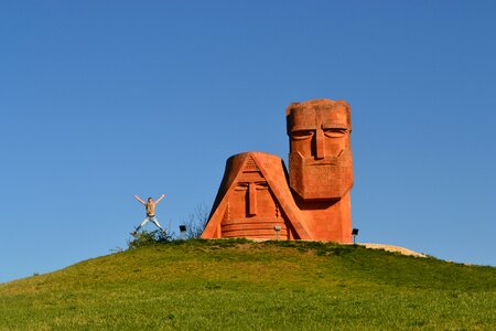 Grandma and grandpa orange tuff sculpture