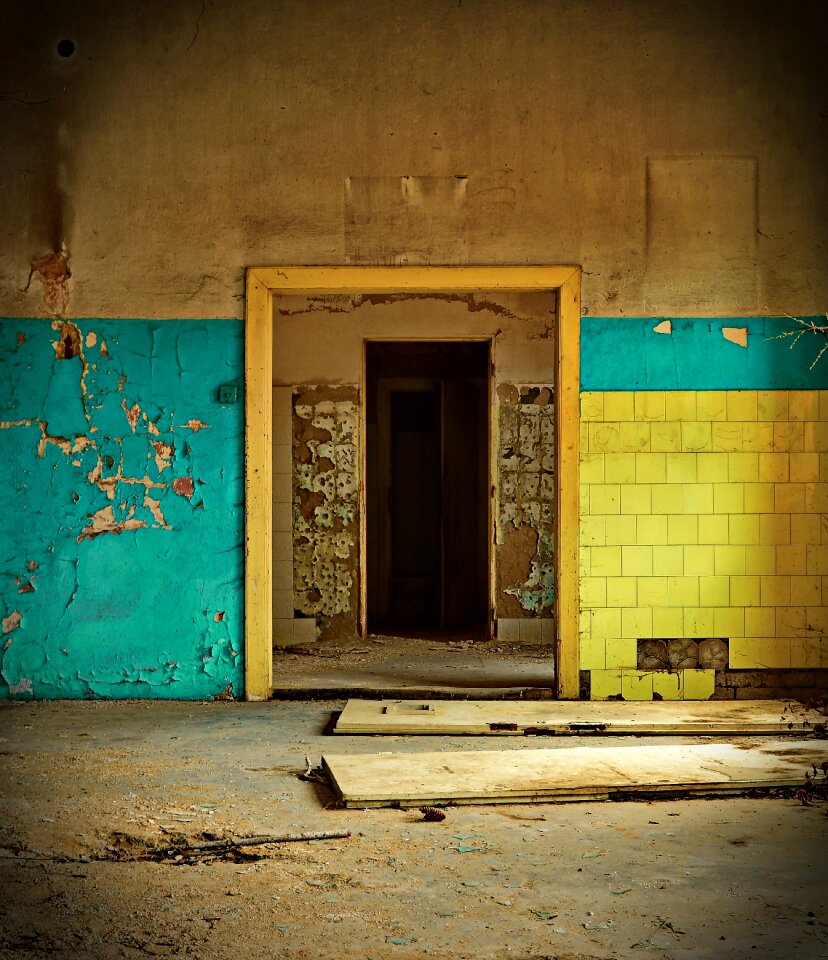 Crumbling abandoned yellow