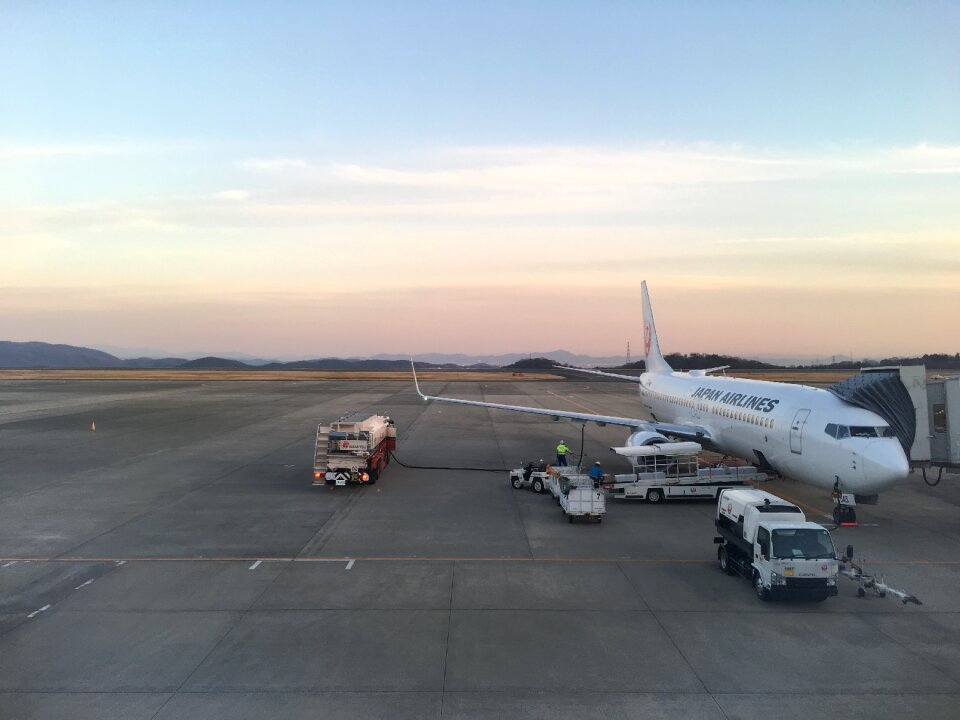 Athletic track airport wings sunset