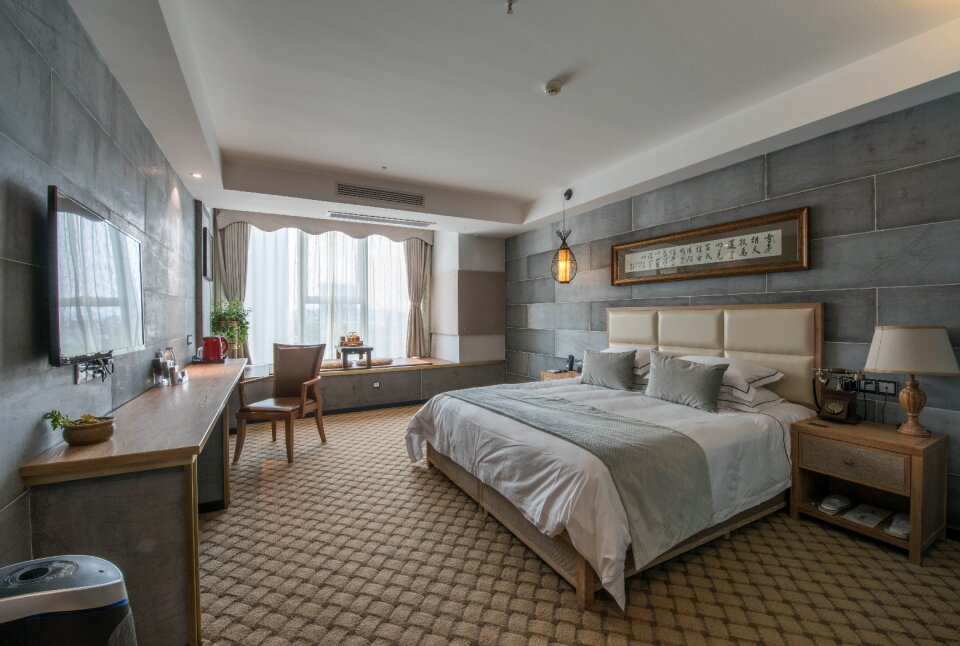 Gray desk gray bed gray hotel