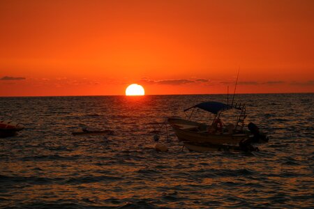 Fishing boat beach beach sunset photo