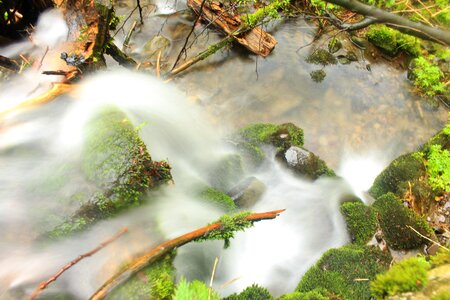 Torrent waterfall trough photo