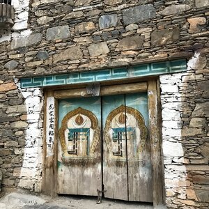 Stone house color of wood door totem