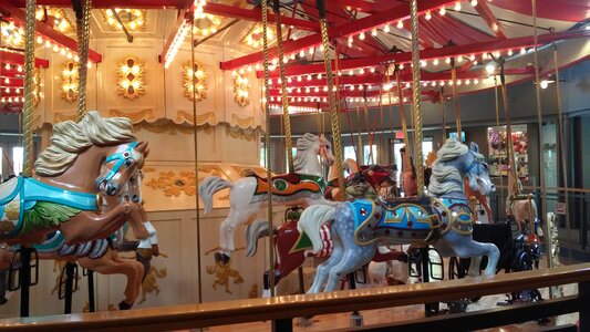 Amusement park merry-go-round kids