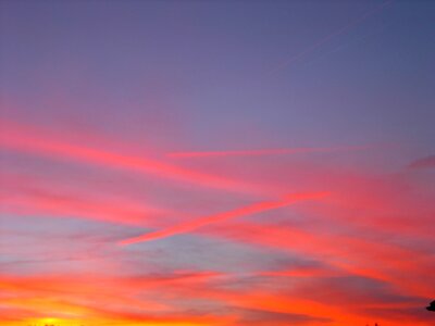 Clouds aircraft trails sky