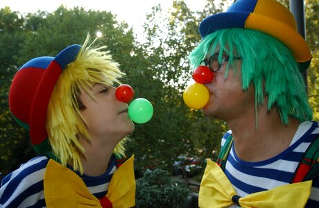 Circus gum chewing gum bubbles father and son photo